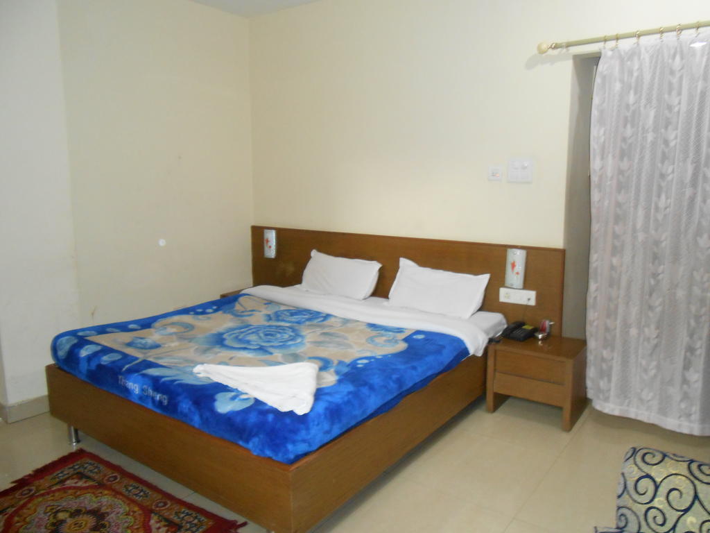 Hotel Fame City Guwahati Oda fotoğraf